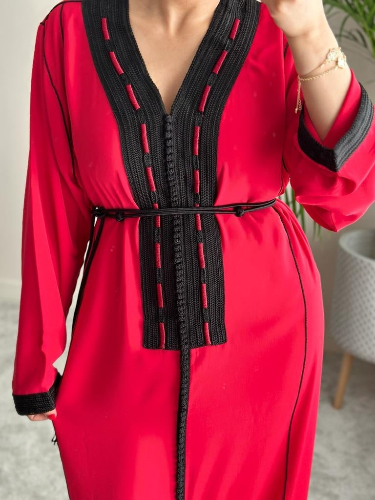 Red kaftan with decorative embroidery in black