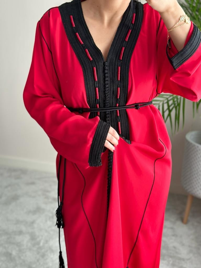 Red kaftan with decorative embroidery in black