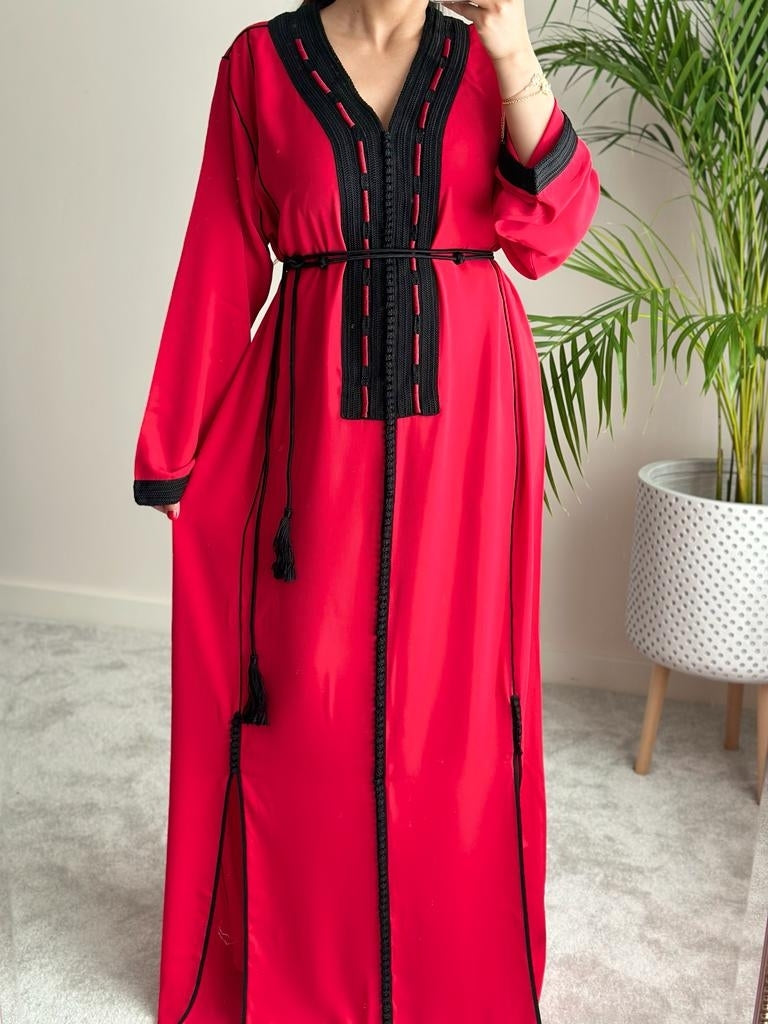 Red kaftan with decorative embroidery in black