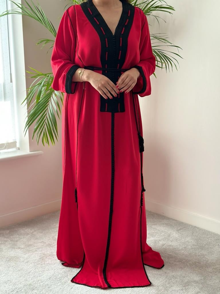 Red kaftan with decorative embroidery in black